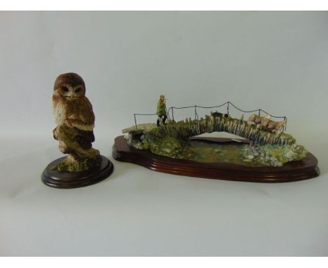 A Border Fine Arts limited edition model of a farmer, his sheep dog and a pair of sheep crossing a stone bridge - Off To The 