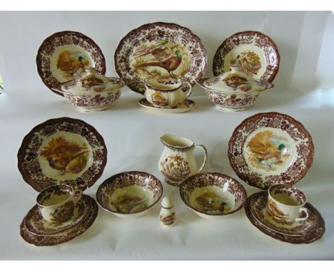 An extensive collection of Royal Worcester Palissy Game Series dinner and tea wares including a pair of covered tureens, sauc