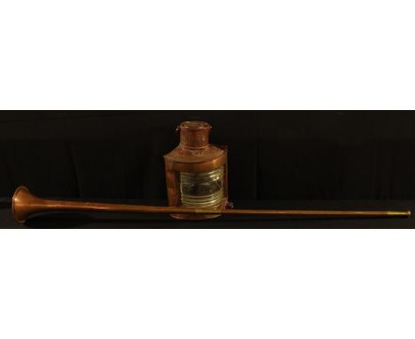 A copper ship's port lamp, 30.5 cm high; a copper hunting horn (2) 
