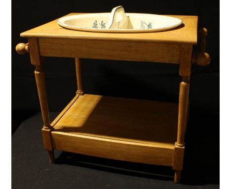 A late 19th/early 20th century child's nursery pine wash stand with ceramic bowl, the bowl blue and white transfer printed wi