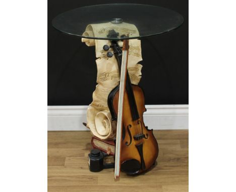 Interior Design - a novelty ocassional table, circular glass top, the base as a musical trophy with a violin and bow, a scrol