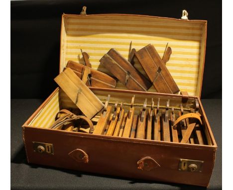 Carpentry Tools - a collection of boxwood moulding planes contained in leather suitcase 