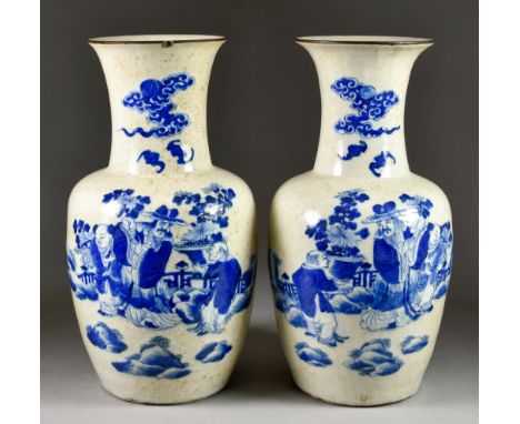 A Pair of Chinese Blue and White Porcelain Vases, Late 19th/Early 20th Century, painted with figures in a fenced garden, the 