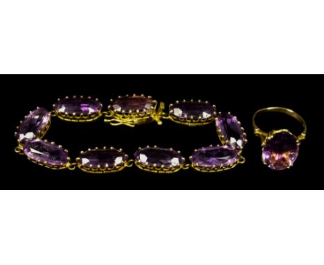 An Amethyst Bracelet and Ring, the bracelet set with nine oval faceted amethyst stones, 190mm in length, the ring set with a 