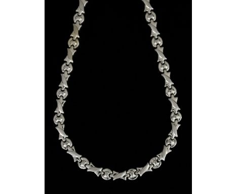 A 14ct White Gold Flat Link Necklace, 600mm in length, 29.5gChain presents in excellent overall condition showing wear commen