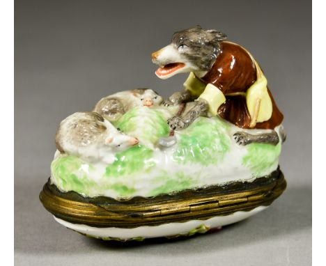 A Continental Porcelain Snuff Box, 20th Century, modelled with an anthropomorphic fox creeping up on two sleeping sheep, the 