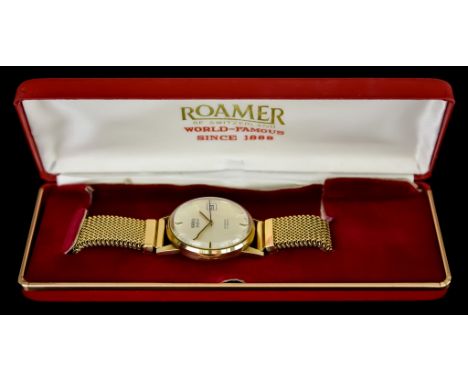 A Gentleman's Automatic Wristwatch, by Roamer, model "Lime Light", 9ct gold case, 32mm diameter,&nbsp;silver dial with gold b