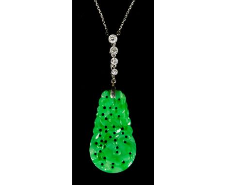 A Carved Jade Pendant, set with a faceted white sapphire stones, suspended on fine platinum chain, 400mm in length, gross wei