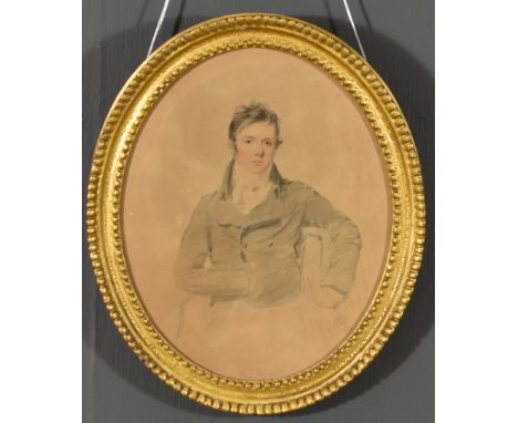 Style of Sir Thomas Lawrence (1769-1830) - Pencil and wash - Half-length portrait of seated young gentleman, oval 9.5ins x 7.