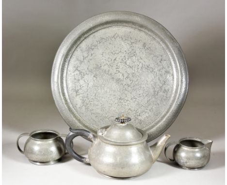 A Liberty &amp; Co 'Tudric' Pewter Tea Set&nbsp;with hammered finish, No.01075, made for Liberty's by the Birmingham firm W.H