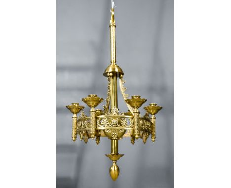A Brass Six-Light Hanging Candelabra of Ecclesiastical Design, the central column with circular pierced frame cast with leaf 