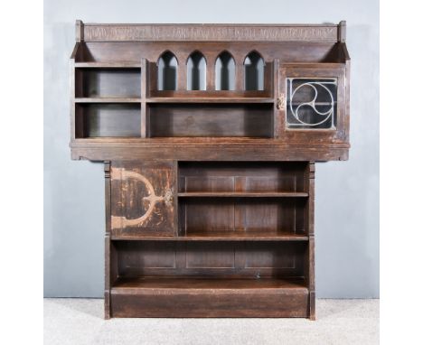 Liberty & Co, Arts and Crafts Oak Dresser/Bookcase, the superstructure with an embossed frieze panel  'Read not to believe & 