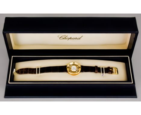 A Lady's Quartz Movement Wristwatch, by Chopard, Model Happy Diamonds, serial No. 981130, 18ct gold case, 32mm diameter, with