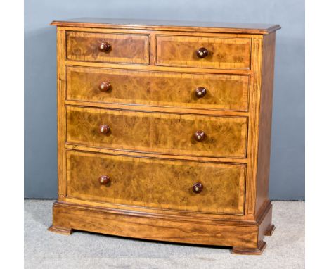 A Modern Burr and Cross Banded Walnut and Oak Chest of Drawers, by Frank Hudson, with moulded edge to top, fitted two short a