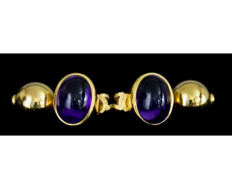 A Pair of Yellow Metal Earrings, for pierced ears, set with cabochon amethyst stones, gross weight 9.7g Note: Metal unmarked 