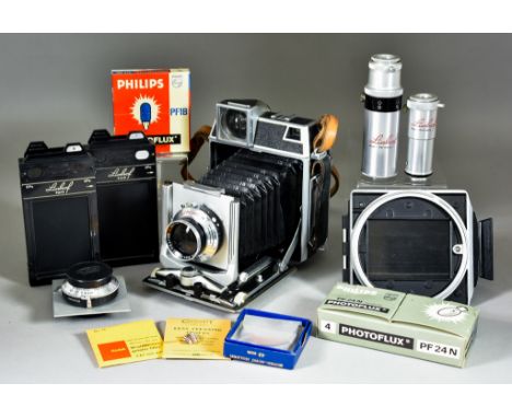 A Linhof Super Technika Plate Camera, No. 47008, with a series of accessories, in Linhof fitted case The lenses with the came