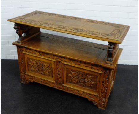 Carved light oak carved oak Monk's bench with lion arm rests 76 x 112cm