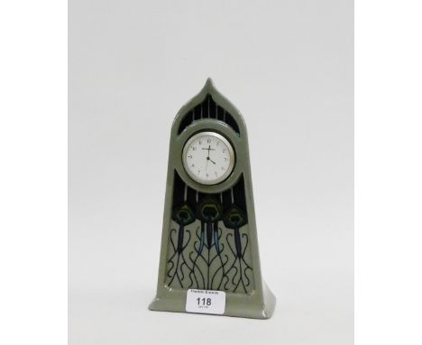 Moorcroft mantle clock with stylised tube lined floral pattern and arched top, 23cm high