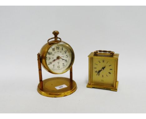 Modern brass clock together with a carriage clock, (2) 