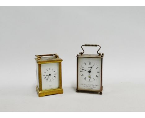 St. James brass cased carriage clock, together with a Smith's carriage clock, (2) 