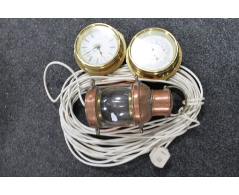A copper miniature electric lamp together with a brass barometer and wall clock 