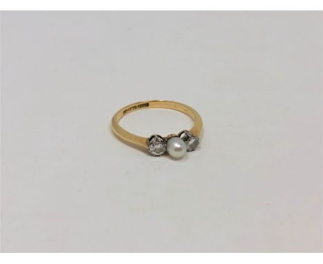 An 18ct gold pearl and diamond ring, size P.  CONDITION REPORT: 2.4g. 