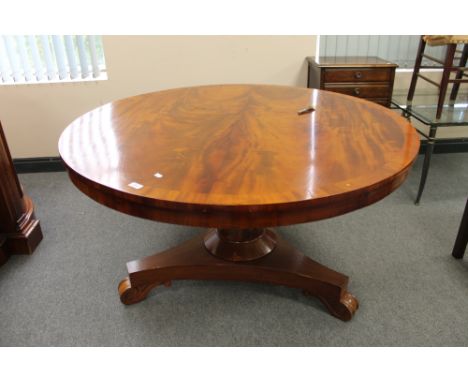 A nineteenth century mahogany circular breakfast table, width 131 cm, height 72 cm. CONDITION REPORT: The table has small ven