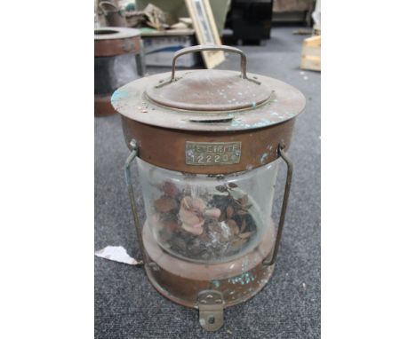A copper ship's lamp 