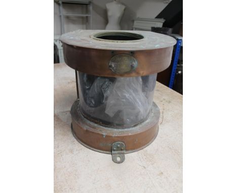 A copper mast head lamp 