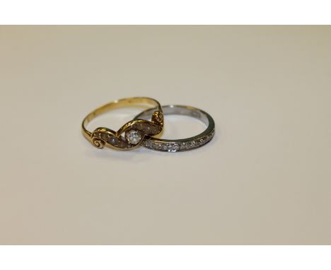 An 18ct gold half eternity diamond ring together with a pearl and diamond ring. (2)