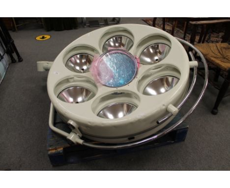 A hospital theatre lamp with multi directional swing arm 