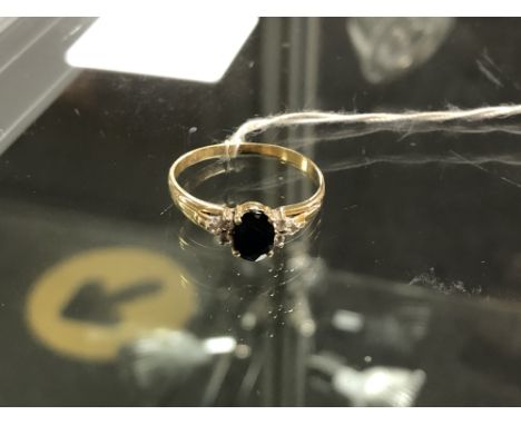 An 18ct gold sapphire and diamond ring, size U CONDITION REPORT: 3.1g