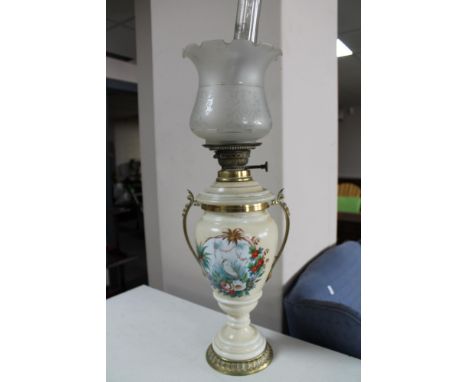 A 19th century ceramic and glass oil lamp 