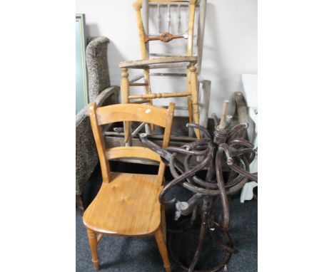 An antique wooden bench together with two chairs, stick stand and chair (for restoration).