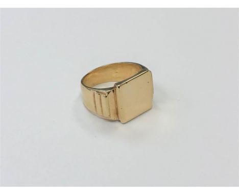 A gent's heavy yellow metal signet ring, indistinct foreign marks, stamped 585, size S CONDITION REPORT: 16.2g