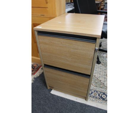 A light oak two drawer filing chest 