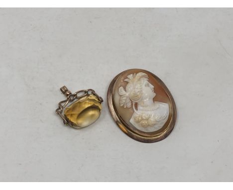 An antique gold cameo and a citrine fob (2)