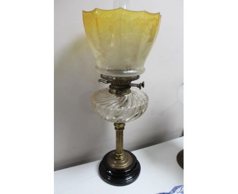 A Victorian glass oil lamp, height 54 cm. CONDITION REPORT: The glass is in un damaged condition, as is the rest of the lamp.