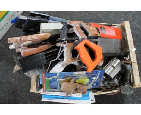A crate of wood working tools, saws etc 
