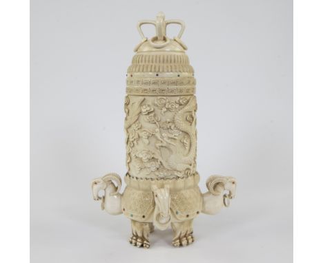 Ivory censer with remarkably high stupa-shaped upper part decorated with a four-clawed dragon and ram's heads (Ibexes) beneat