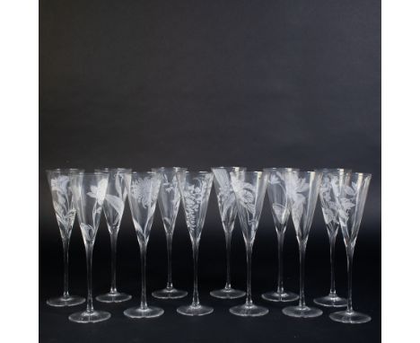 12 Crystal champagne glasses ‘LES FLEURS’ issued by the Franklin Mint in collaboration with Perrier Jouet, each glass is etch