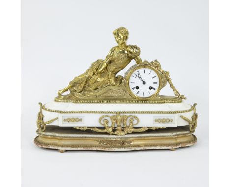 French ormolu and white marble mantle clock surmounted by a reclining figure on a stepped marble base on a marble plinth, med