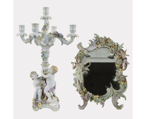 Candlestick and mirror made of polychrome porcelain, sumptuously decorated with flowers and playing children, Italy, 20th cen