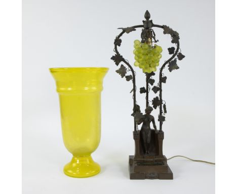 Art Deco lampadaire in wrought iron decorated with leaves, a nude and bunch of grapes, added a yellow glass vaseArt Deco lamp