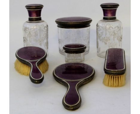 A continental silver and enamel dressing table setThe purple guilloche enamel over an engine turned ground, with white enamel