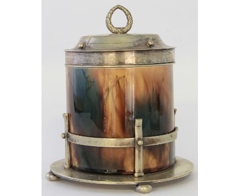 A 19th century continental Majolica biscuit barrel Having silver-plated mount and cover, raised on a silver-plated circular s