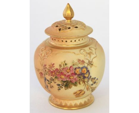 A Royal Worcester blush ivory potpourri and coverHand-painted with flowers and foliage below a reticulated rim, puce factory 