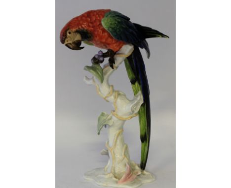 A large and impressive Rosenthal ceramic model of a parrot
Having multi-coloured decoration of red, green, lilac and white, m