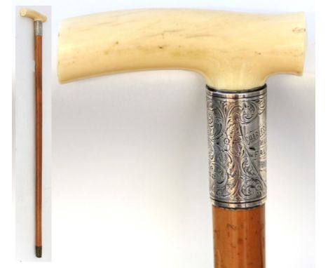 A George V hallmarked silver ferruled walking stick with ivory handleOf plain form, having chased decorated ferule, and prese