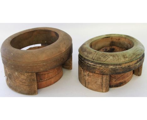 Two vintage fruitwood hat blocks and standsEach of typical form with oval stands, height 18cm, length 28cm